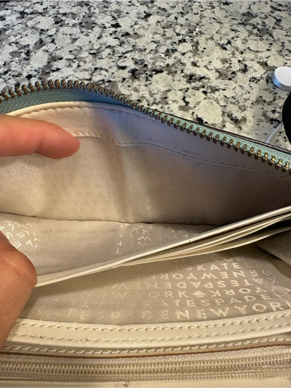 kate spade pastel blue zip-around leather wallet